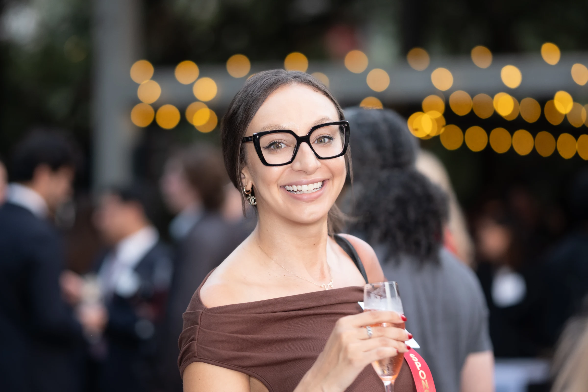 A smiling guest at a reception